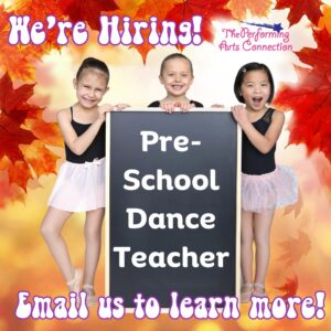 Hiring poster with three kids in ballet clothes holding a large chalkboard.
