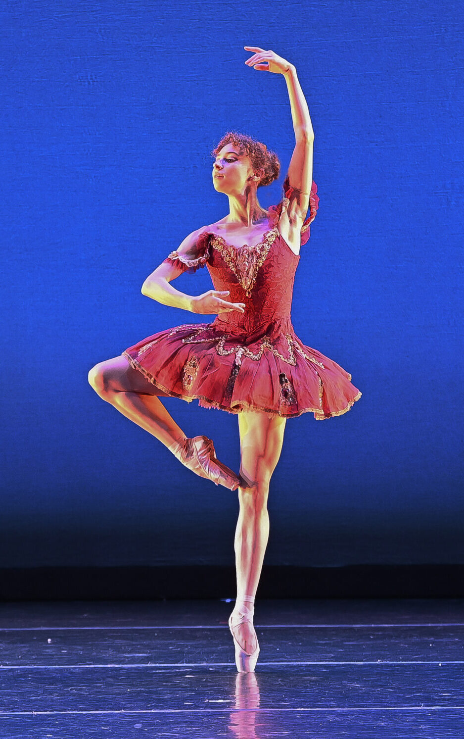 Photo of ballerina in a rélévé passé