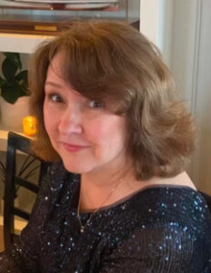 Woman smiling in headshot