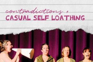 a woman with a bullhorn shouts at three other women in a line