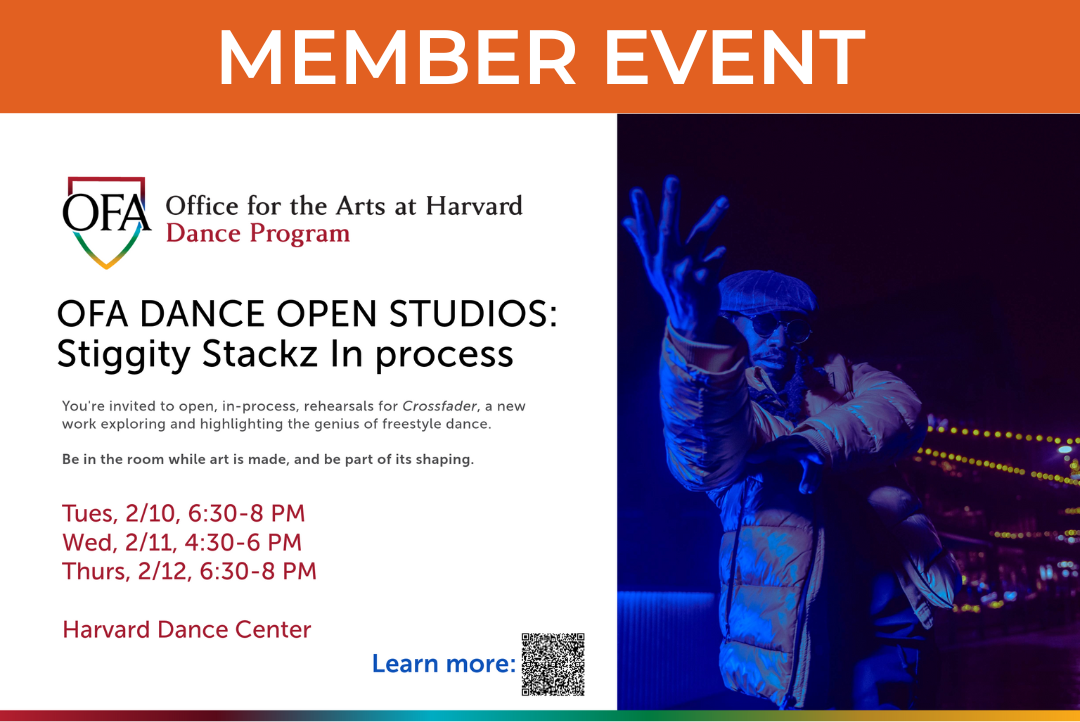 Picture of artist dancing in low-light environment.